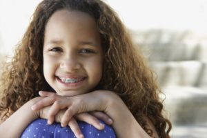 Why Your Child Should See An Orthodontist By Age 7