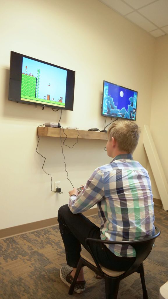 Playing games in waiting area